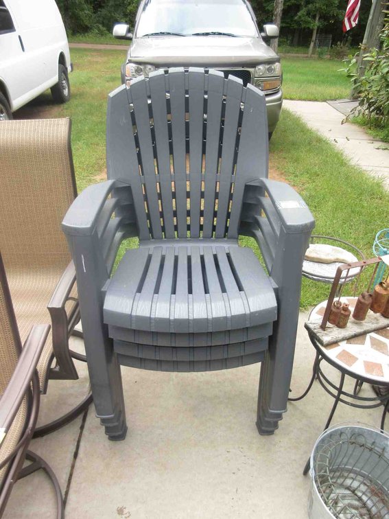 (4) Plastic patio chairs