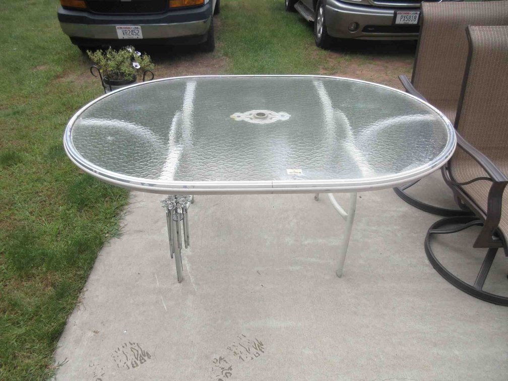 Glass top patio table
