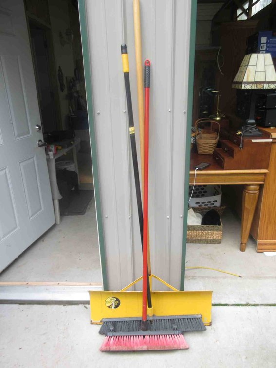 Metal snow shovel and (2) brooms