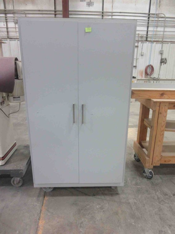 Laminate rolling cabinet with contents of banding