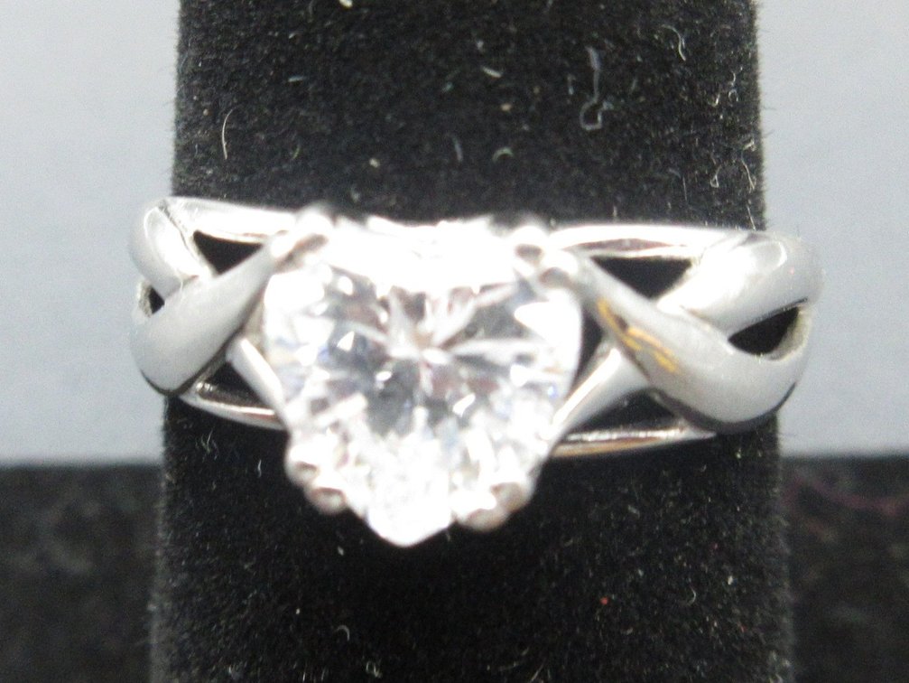 Sterling silver heart cut white topaz ring