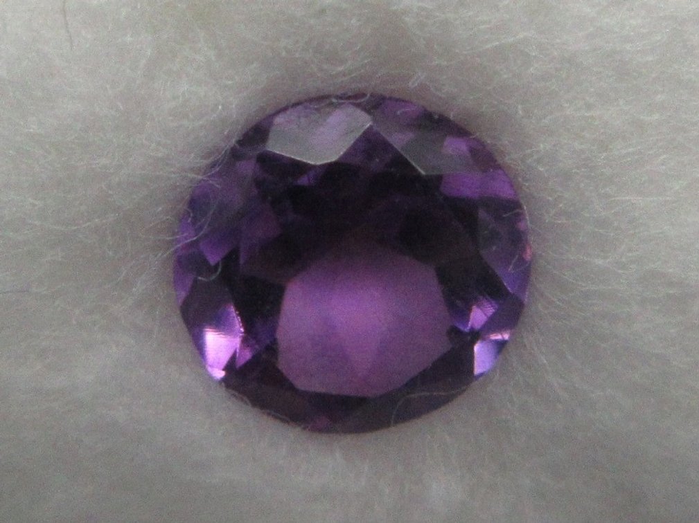 Precious round purple amethyst stone