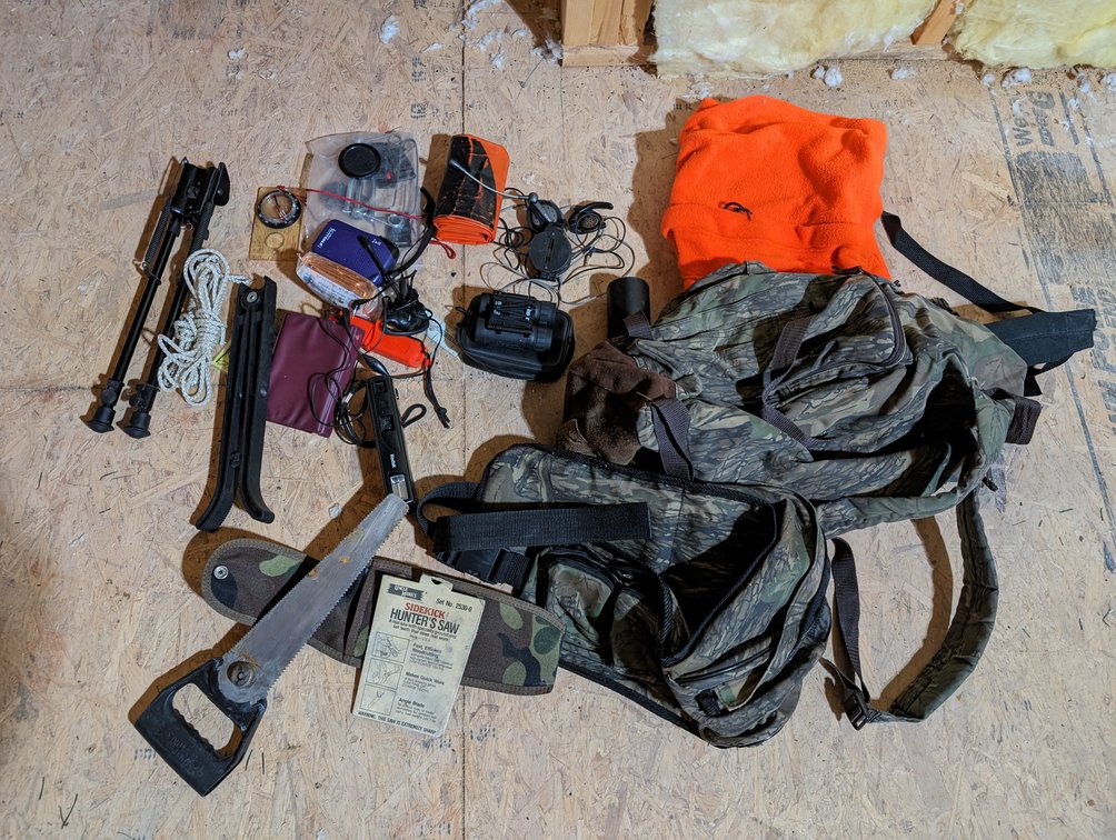 2 Backpacks, 1 Belt Bag, and 1 Sidekick Hunter Saw with misc. items 