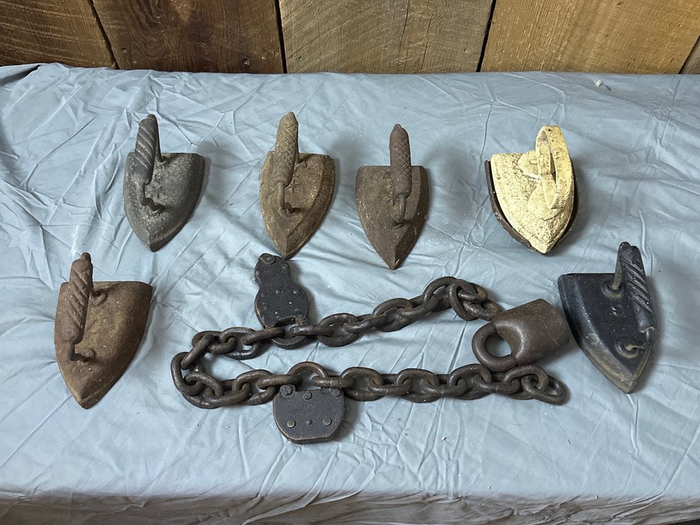 Fireplace irons and old chain and locks 