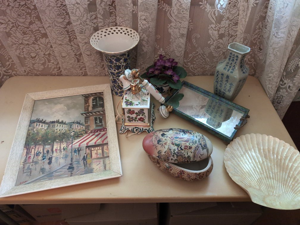 Decorative old telephone with assortment of decorations 