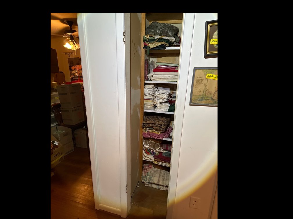 Closet of cloth napkins and cloth table cloths 