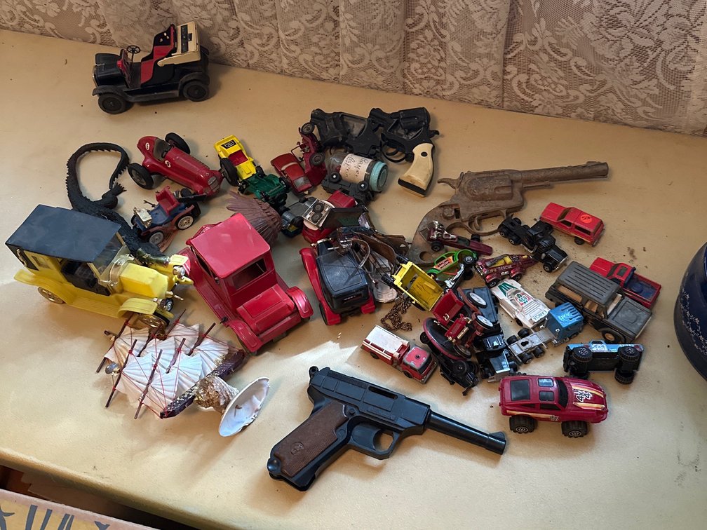 Toy cars and guns 