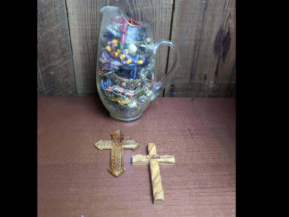 Glass of mystery vintage jewelry and 2 small crosses 