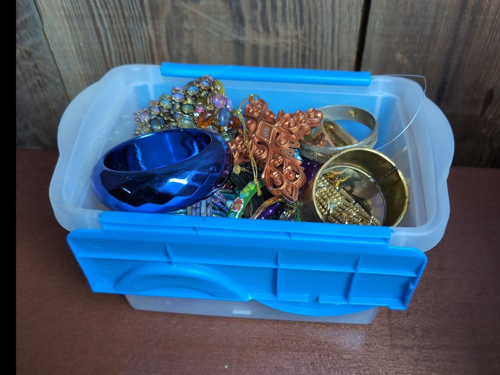 Container of vintage bracelets 