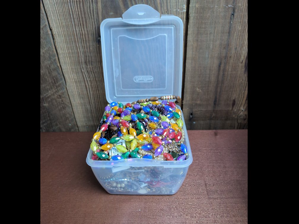 Container of vintage mystery jewelry 