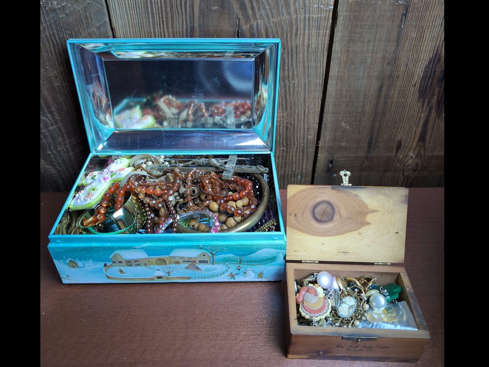 2 decorative boxes filled with mystery jewelry 