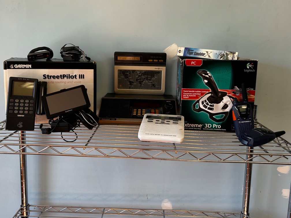 Garmin GPS navigating system; Logitech Joystick; Walkie-talkies and more