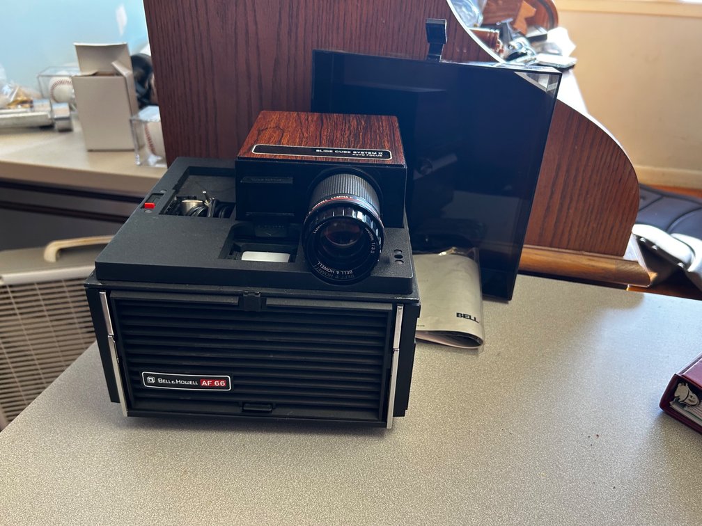 Vintage Bell and Howell AF66 Slide Cube Projector with Da-Lite Projector Screen