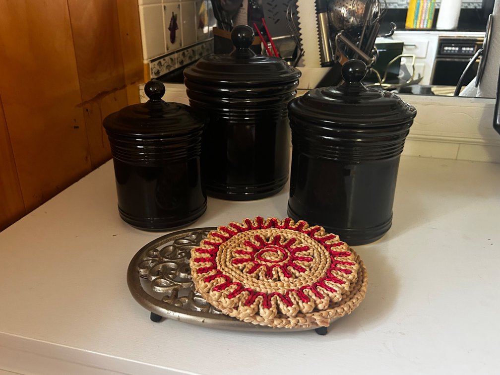 Black Canisters with Potholders