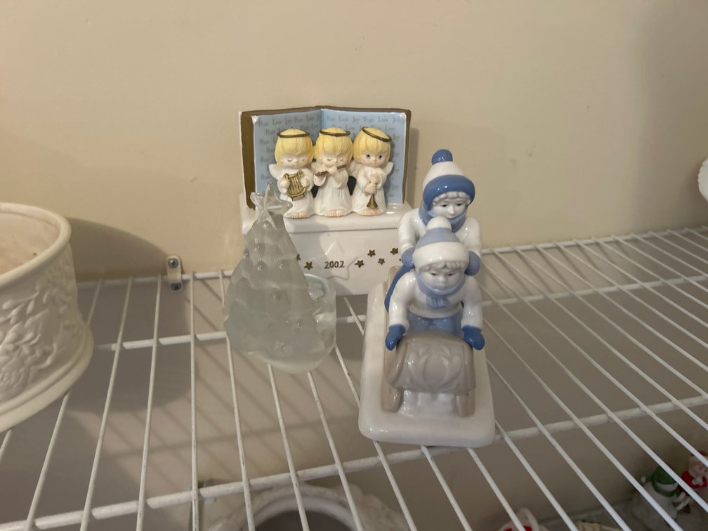 Porcelain Paul Sebastian Sled Figurine