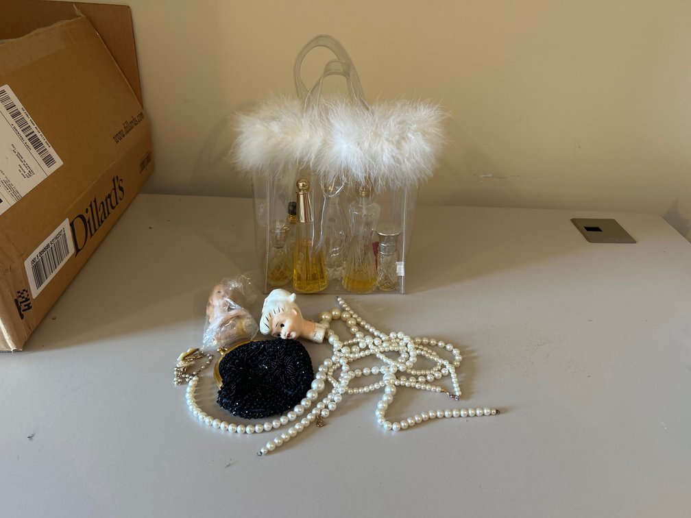 Black Clutch, Jewelry, Perfume Bottles