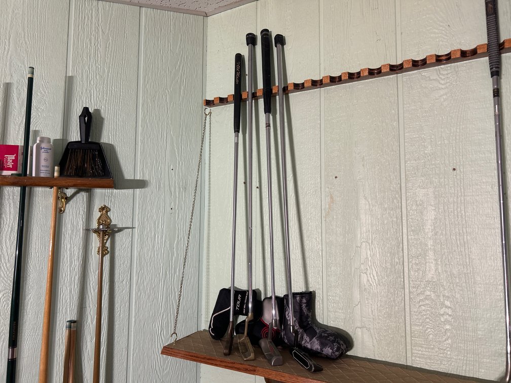 Four Golf Putters