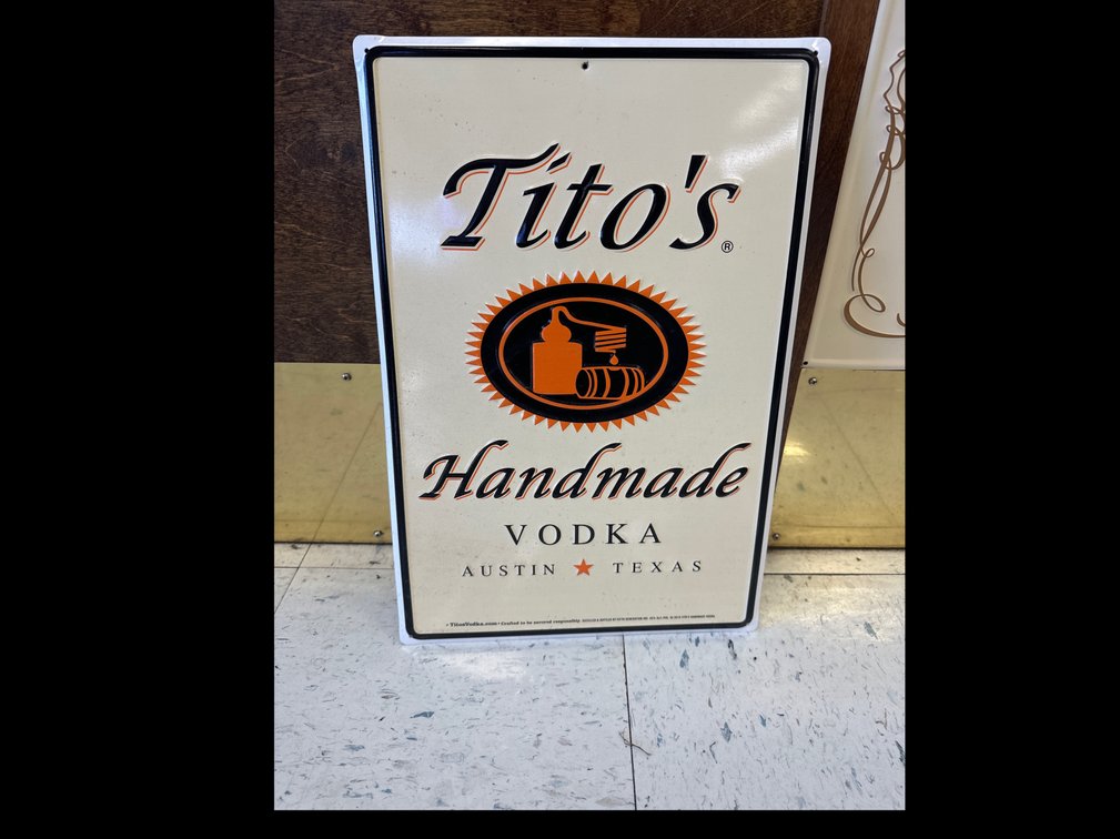 Metal Titos Sign