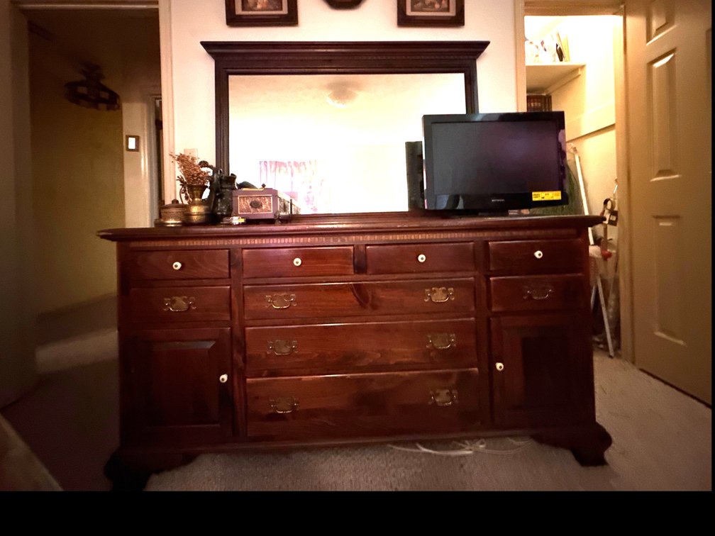 Dresser WITH contents that are in the drawers.