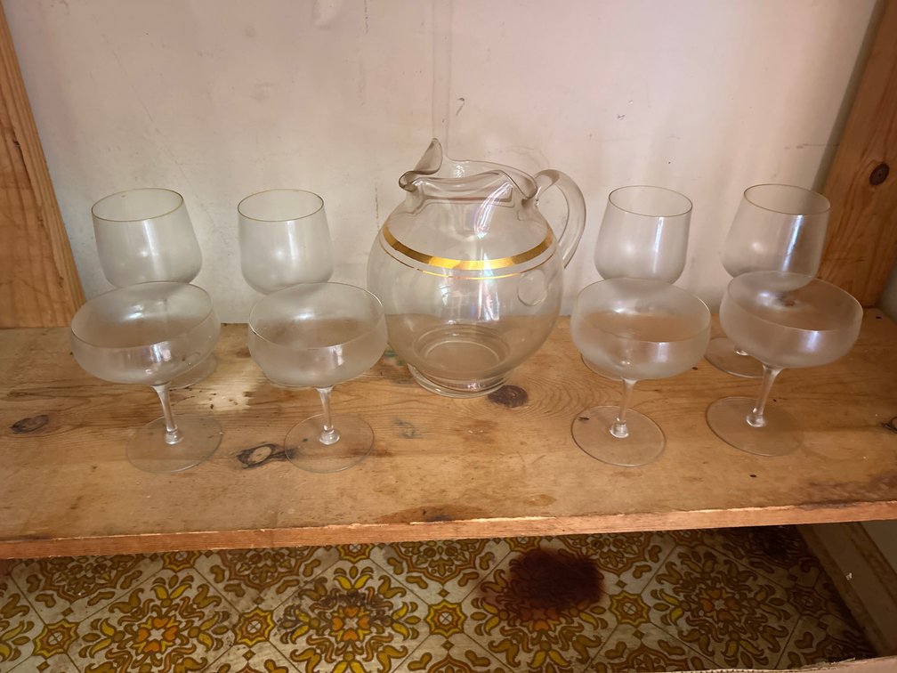 Glass Pitcher with Wine and Champagne Glasses