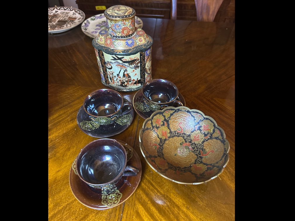 Decorative Canisters, Tea Cups, and Bowl