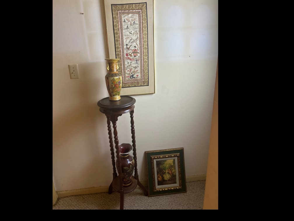 Tall Small Side Table with Vases and Pictures