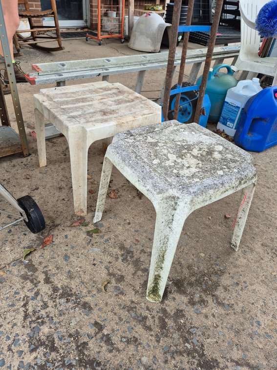 2 small plastic patio tables