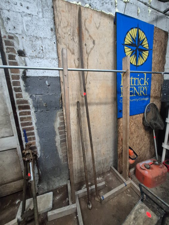 Heavy steel 8ft pry/tamping bar and another bar