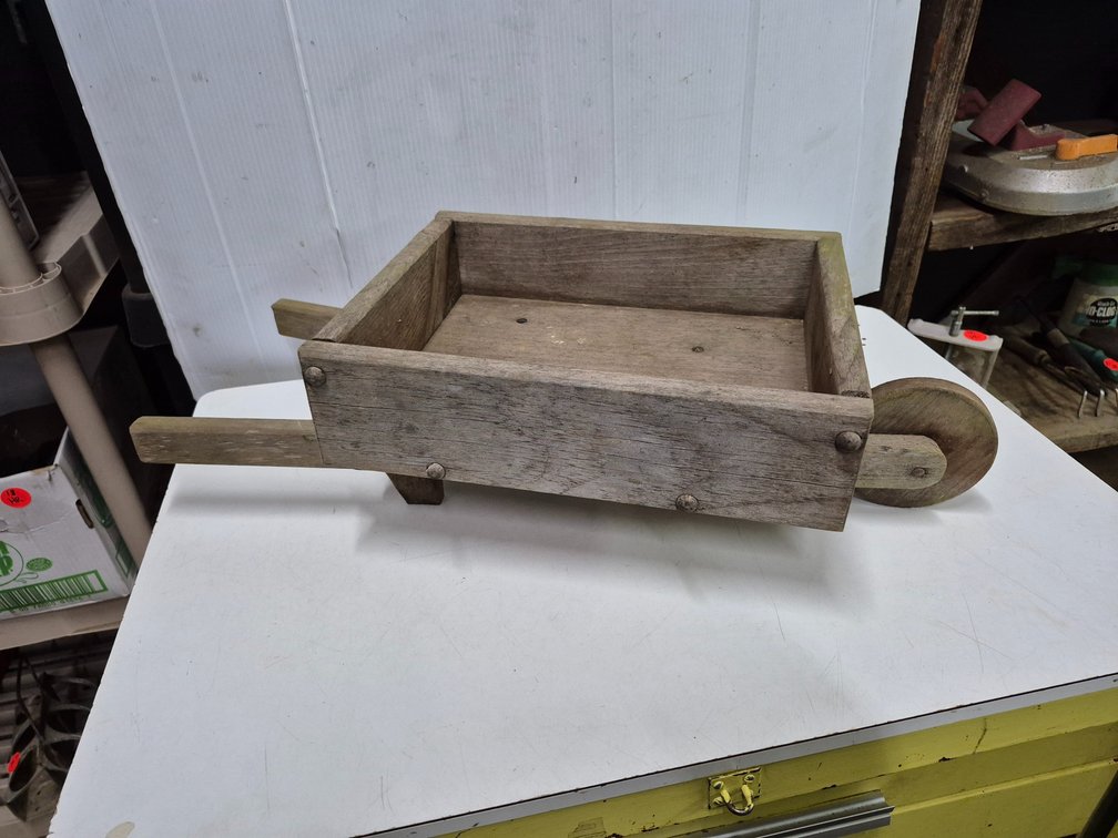 Hand made wooden wheelbarrow planter