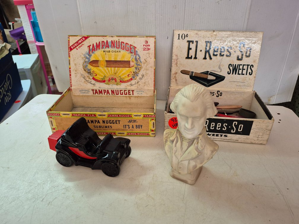 Cigar box of pens+, Avon cologne bottles