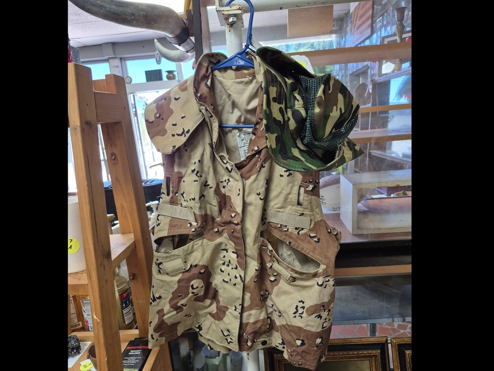 Military desert camo vest and jungle camo boonie hat