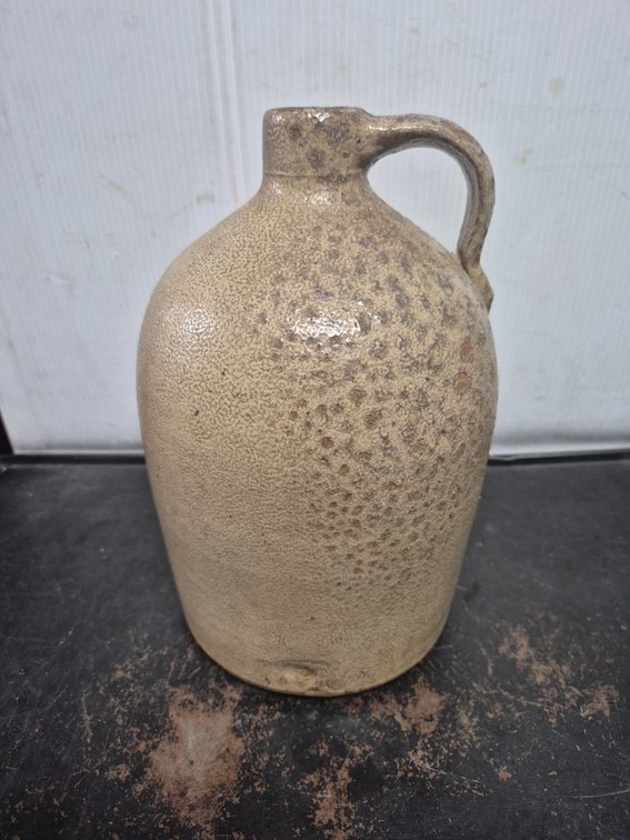 Handmade glazed pottery jug