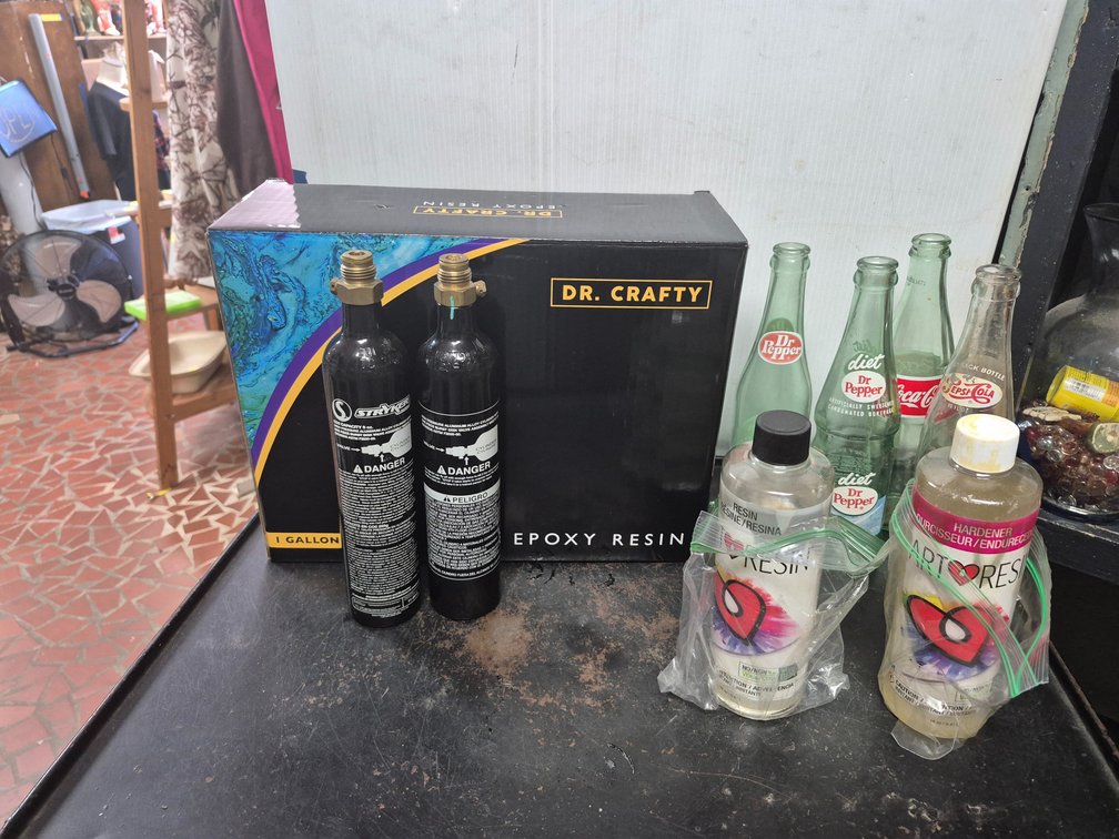 2 part epoxy resin kit, CO2 canisters, soda bottles+