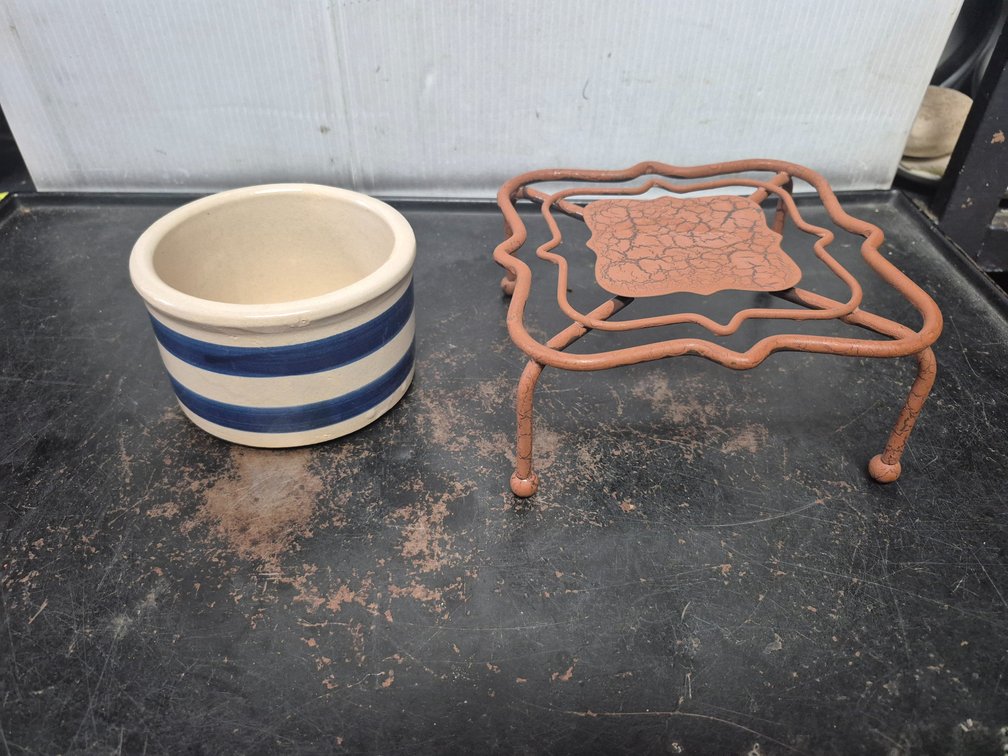 Robinson Ransbottom Co. Roseville bowl and a metal stand