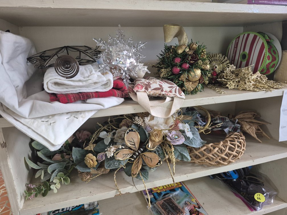 2 shelves of Christmas decor, ornament, ribbon++