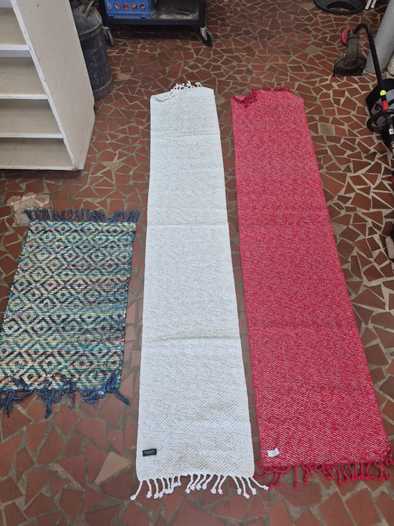 (2) 7ft table runners and a braided throw rug