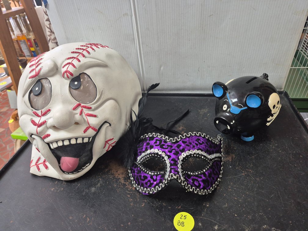 2 masks and a pirate piggy bank