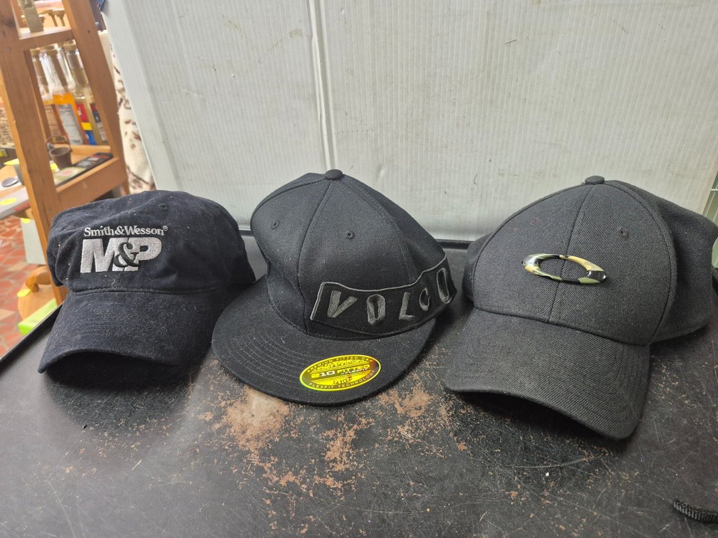 Smith & Wesson, Volcom, Oakley caps