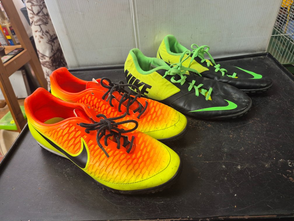 2 pairs of Noke soccer cleats
