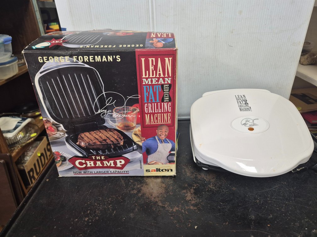 George Foreman "The Champ" grilling machine