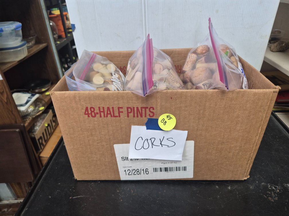 Box full of assorted corks