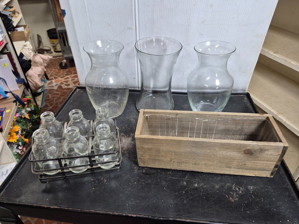 Glass vases, wood planter, glass bottles in caddy