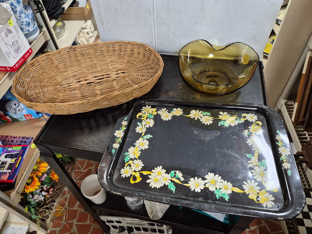 Enameled serving tray, amber glass bowl, wicker basket