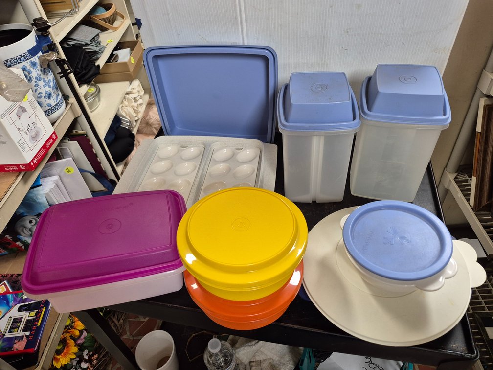 Shelf full of Tupperware dishes