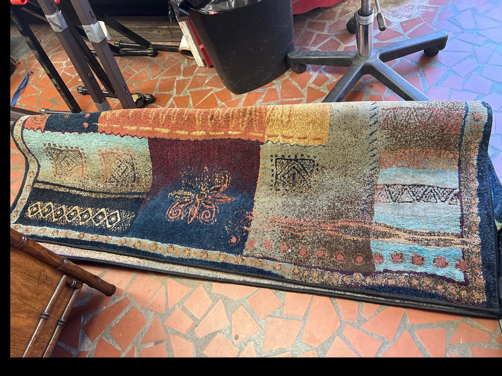 Carpet: Bacova, 63” by 90”.