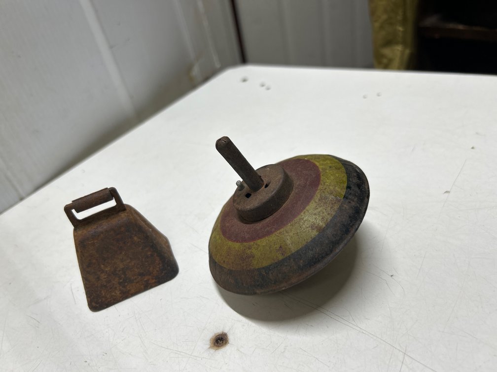Vintage Spinning Top and Small Cow Bell