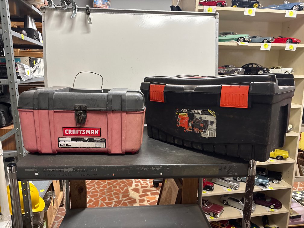 Two plastic tool boxes: one is Craftsman