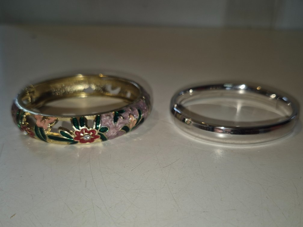 Pretty enameled gold toned bracelet and chrome bracelet