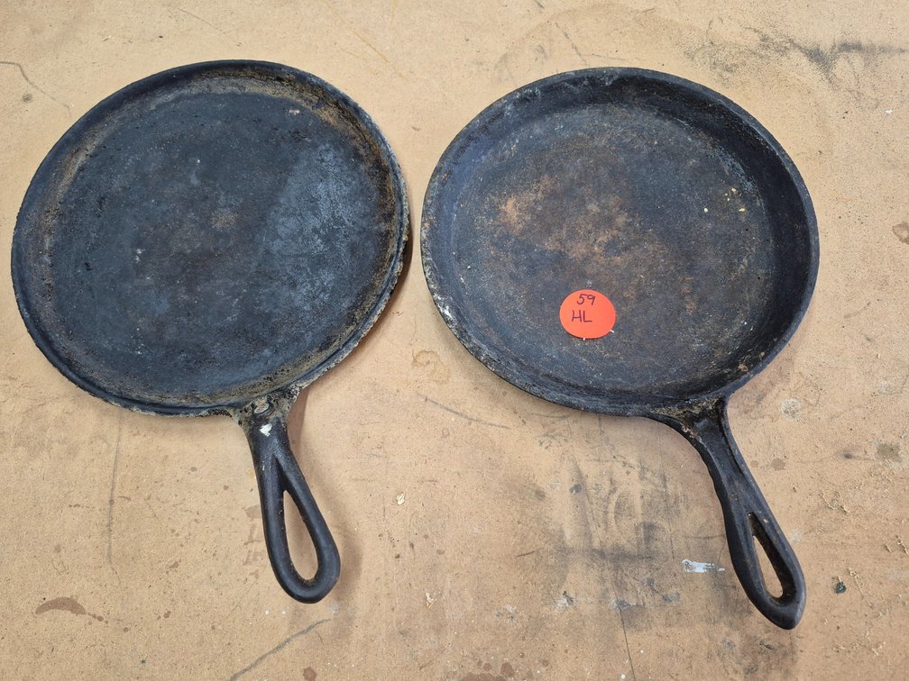2 unbranded cast iron griddle pans