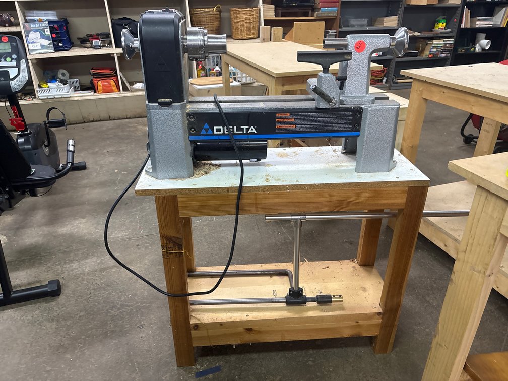 Delta model 48-460 lathe on wood table